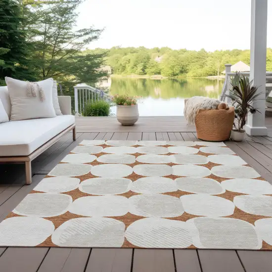 Brown And Ivory Abstract Washable Indoor Outdoor Area Rug Photo 9