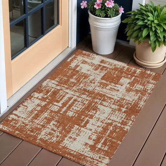 Brown And Ivory Abstract Washable Indoor Outdoor Area Rug Photo 1