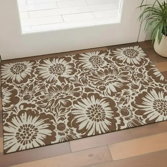Brown And Ivory Floral Washable Area Rug With UV Protection Photo 1