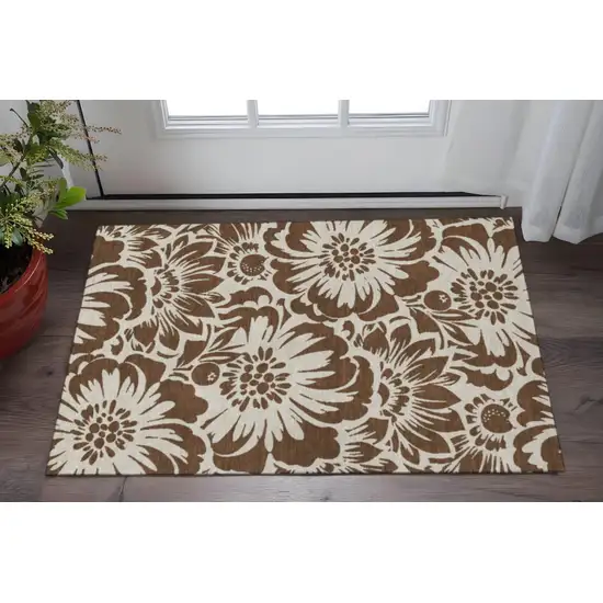 Brown And Ivory Floral Washable Area Rug With UV Protection Photo 2