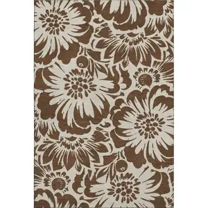 Photo of Brown And Ivory Floral Washable Area Rug With UV Protection