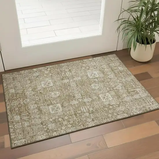 Brown And Ivory Floral Washable Area Rug With UV Protection Photo 1