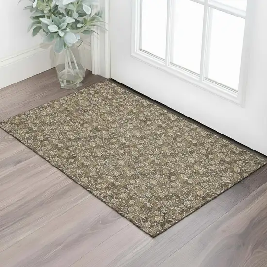 Brown And Ivory Floral Washable Area Rug With UV Protection Photo 1
