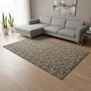 Photo of Brown And Ivory Floral Washable Area Rug With UV Protection