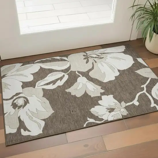 Brown And Ivory Floral Washable Area Rug With UV Protection Photo 1