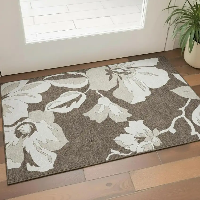 Brown And Ivory Floral Washable Area Rug With UV Protection Photo 1
