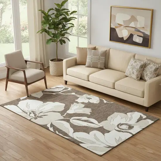 Brown And Ivory Floral Washable Area Rug With UV Protection Photo 1