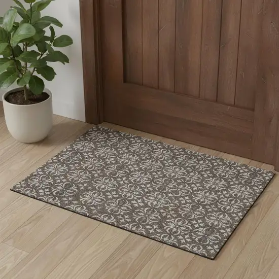 Brown And Ivory Floral Washable Area Rug With UV Protection Photo 1