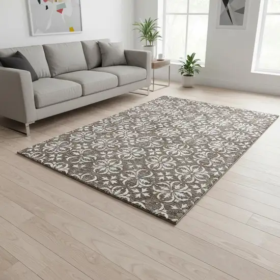 Brown And Ivory Floral Washable Area Rug With UV Protection Photo 2
