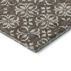 Photo of Brown And Ivory Floral Washable Area Rug With UV Protection