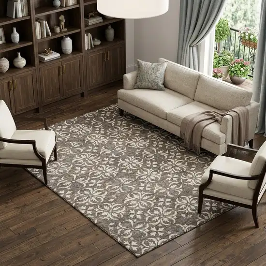 Brown And Ivory Floral Washable Area Rug With UV Protection Photo 1