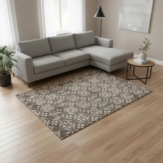 Brown And Ivory Floral Washable Area Rug With UV Protection Photo 2