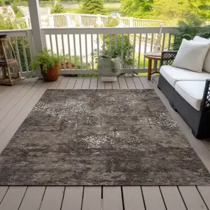 Photo of Brown And Ivory Floral Washable Indoor Outdoor Area Rug