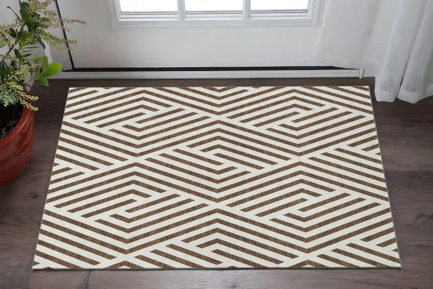 Brown And Ivory Geometric Washable Area Rug With UV Protection Photo 2
