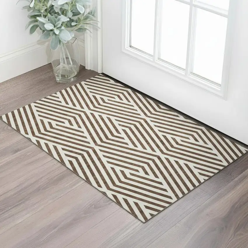 Brown And Ivory Geometric Washable Area Rug With UV Protection Photo 1