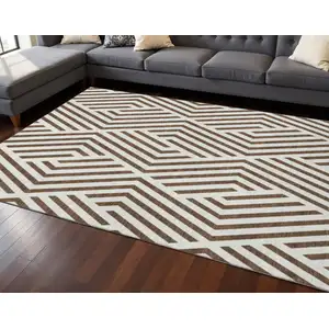 Photo of Brown And Ivory Geometric Washable Area Rug With UV Protection