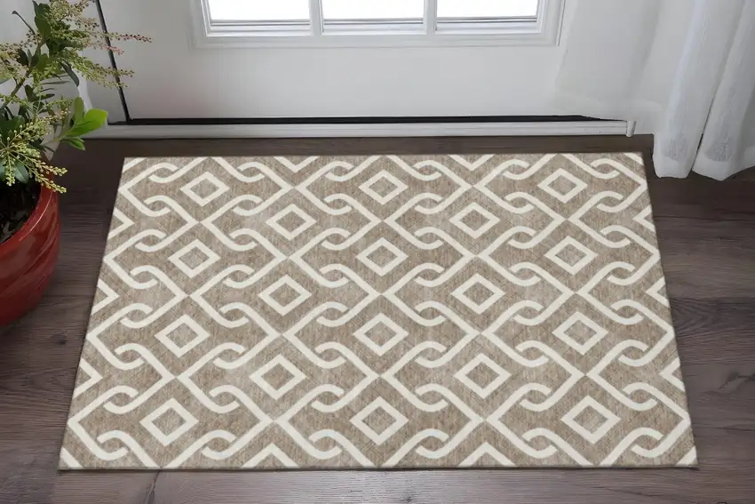 Brown And Ivory Geometric Washable Area Rug With UV Protection Photo 2