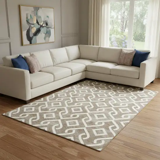 Brown And Ivory Geometric Washable Area Rug With UV Protection Photo 1