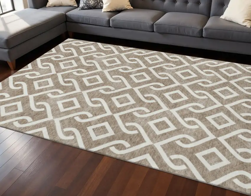 Brown And Ivory Geometric Washable Area Rug With UV Protection Photo 2