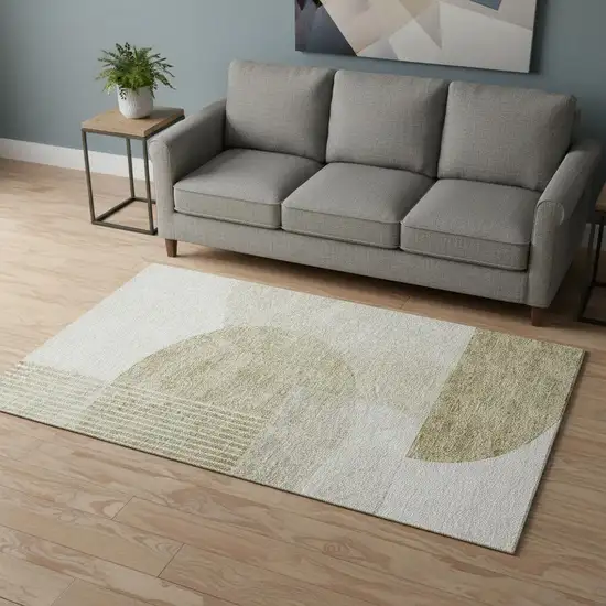 Brown And Ivory Geometric Washable Area Rug With UV Protection Photo 1