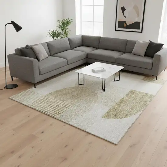 Brown And Ivory Geometric Washable Area Rug With UV Protection Photo 1