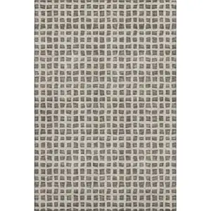 Photo of Brown And Ivory Geometric Washable Area Rug With UV Protection