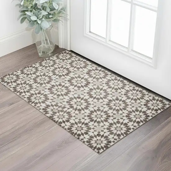 Brown And Ivory Geometric Washable Area Rug With UV Protection Photo 1