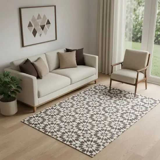 Brown And Ivory Geometric Washable Area Rug With UV Protection Photo 1