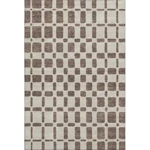 Photo of Brown And Ivory Geometric Washable Area Rug With UV Protection