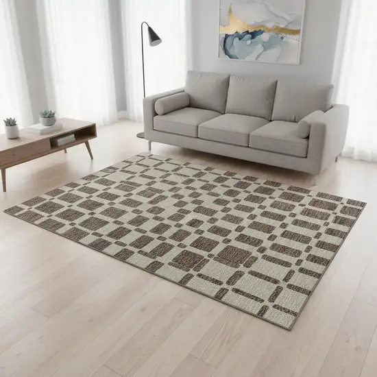 Brown And Ivory Geometric Washable Area Rug With UV Protection Photo 2
