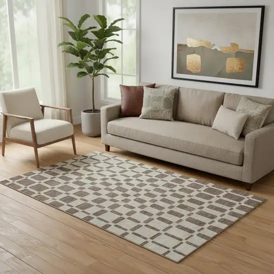 Brown And Ivory Geometric Washable Area Rug With UV Protection Photo 1