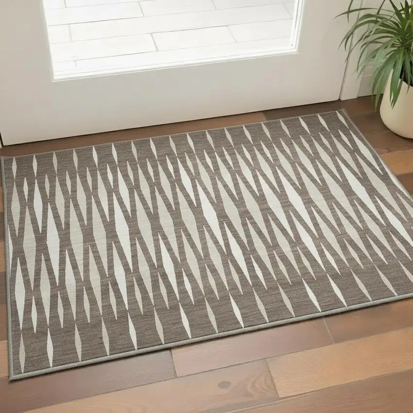 Brown And Ivory Geometric Washable Area Rug With UV Protection Photo 2