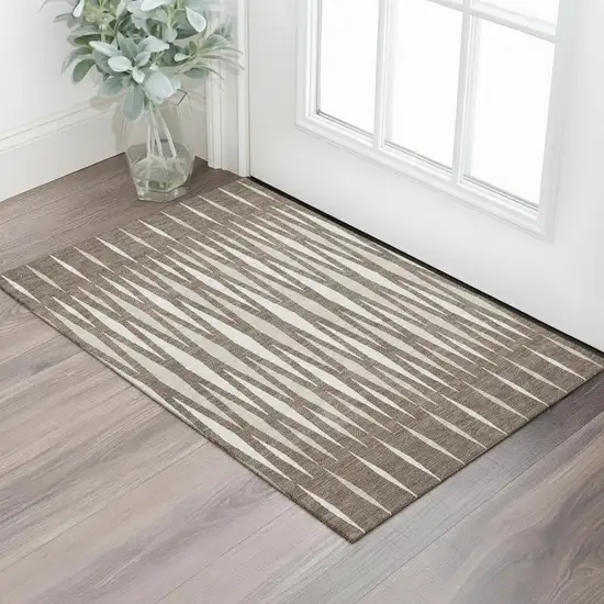 Brown And Ivory Geometric Washable Area Rug With UV Protection Photo 1