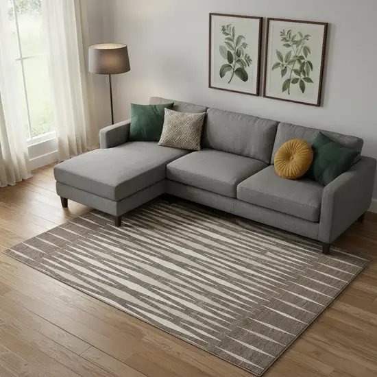 Brown And Ivory Geometric Washable Area Rug With UV Protection Photo 1