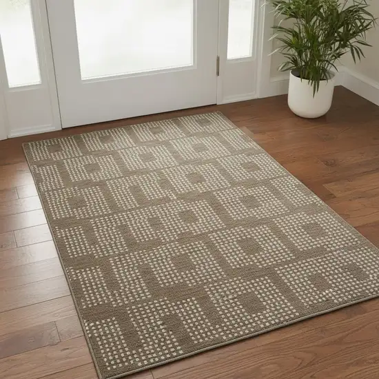 Brown And Ivory Geometric Washable Area Rug With UV Protection Photo 2
