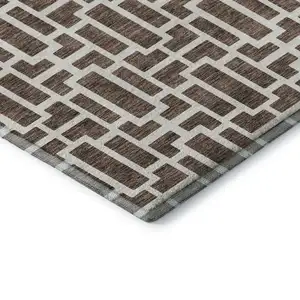 Photo of Brown And Ivory Geometric Washable Area Rug With UV Protection