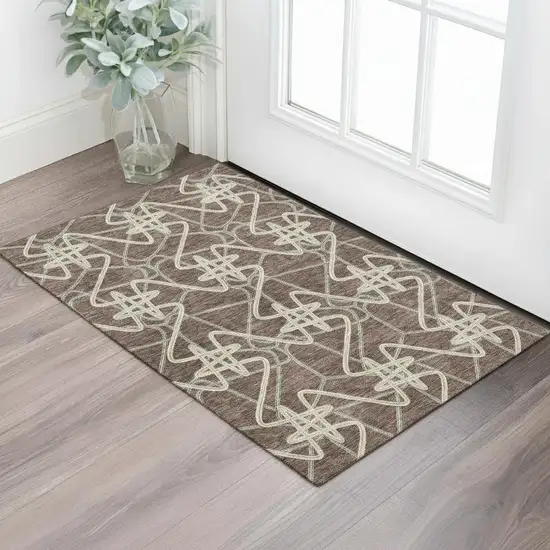 Brown And Ivory Geometric Washable Area Rug With UV Protection Photo 2