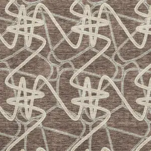 Photo of Brown And Ivory Geometric Washable Area Rug With UV Protection