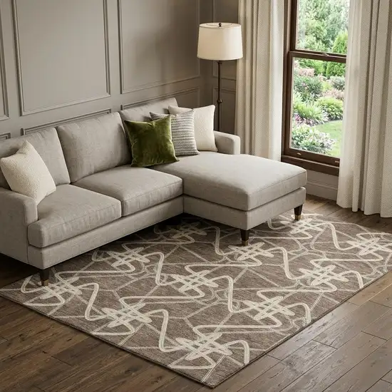 Brown And Ivory Geometric Washable Area Rug With UV Protection Photo 1