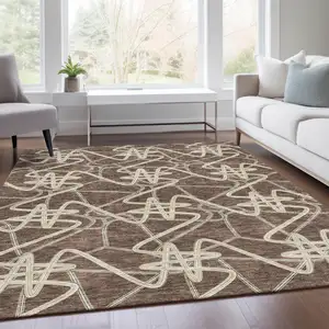 Photo of Brown And Ivory Geometric Washable Area Rug With UV Protection