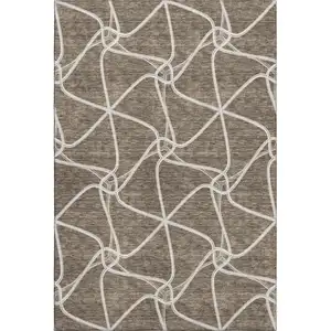 Photo of Brown And Ivory Geometric Washable Area Rug With UV Protection