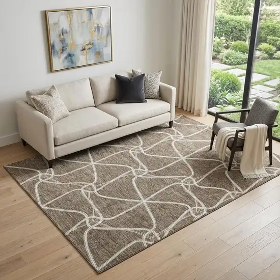 Brown And Ivory Geometric Washable Area Rug With UV Protection Photo 1