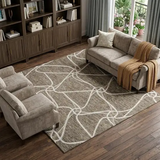 Brown And Ivory Geometric Washable Area Rug With UV Protection Photo 1