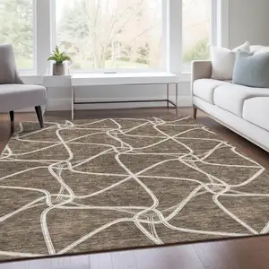 Photo of Brown And Ivory Geometric Washable Area Rug With UV Protection