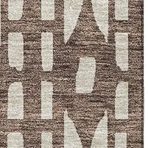 Photo of Brown And Ivory Geometric Washable Area Rug With UV Protection