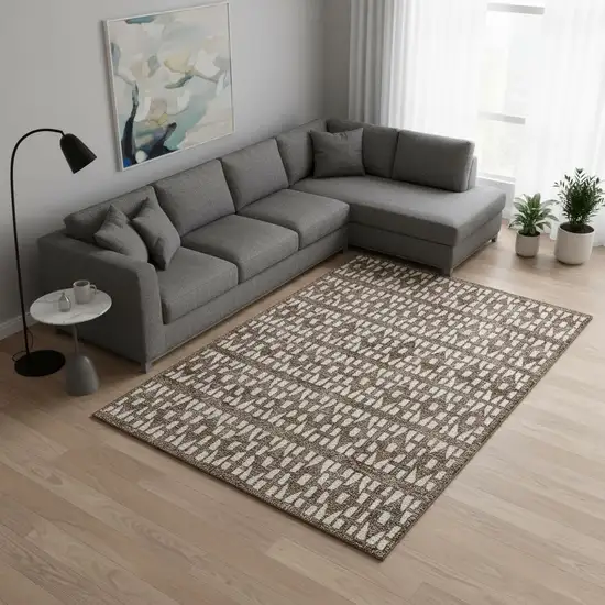 Brown And Ivory Geometric Washable Area Rug With UV Protection Photo 2