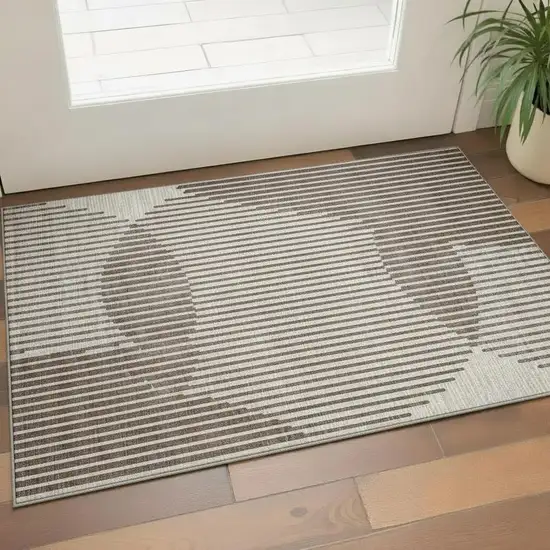 Brown And Ivory Geometric Washable Area Rug With UV Protection Photo 2