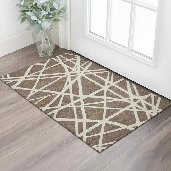 Brown And Ivory Geometric Washable Area Rug With UV Protection Photo 2