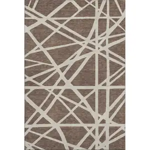 Photo of Brown And Ivory Geometric Washable Area Rug With UV Protection