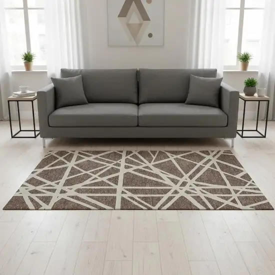 Brown And Ivory Geometric Washable Area Rug With UV Protection Photo 2